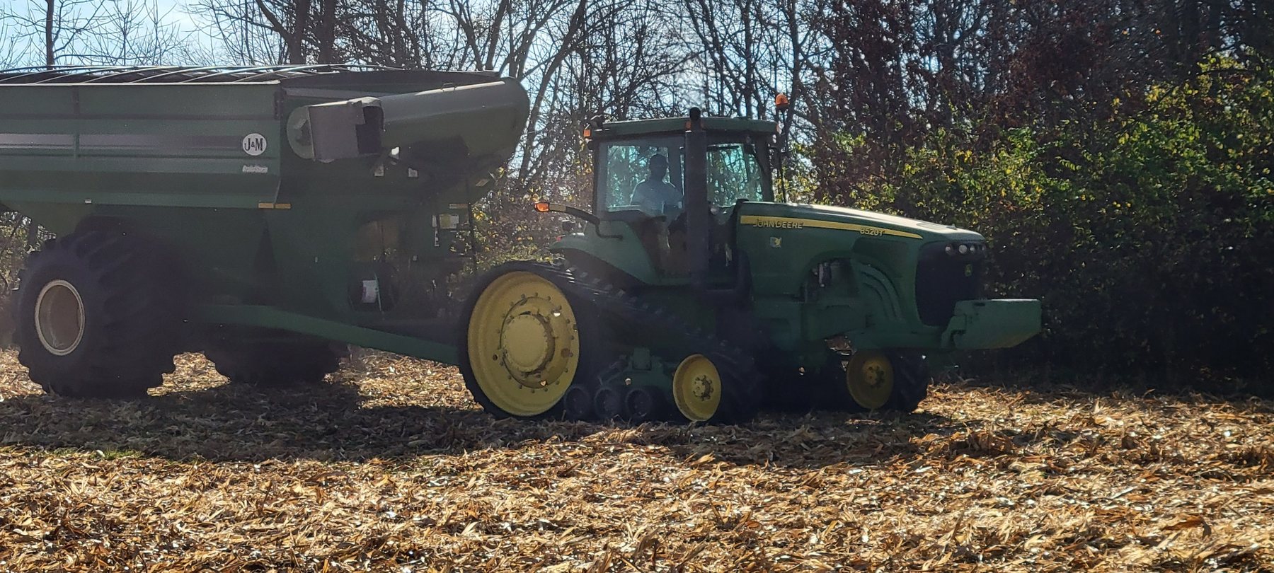 John Deere tractor and grain cart during harvest in Ohio