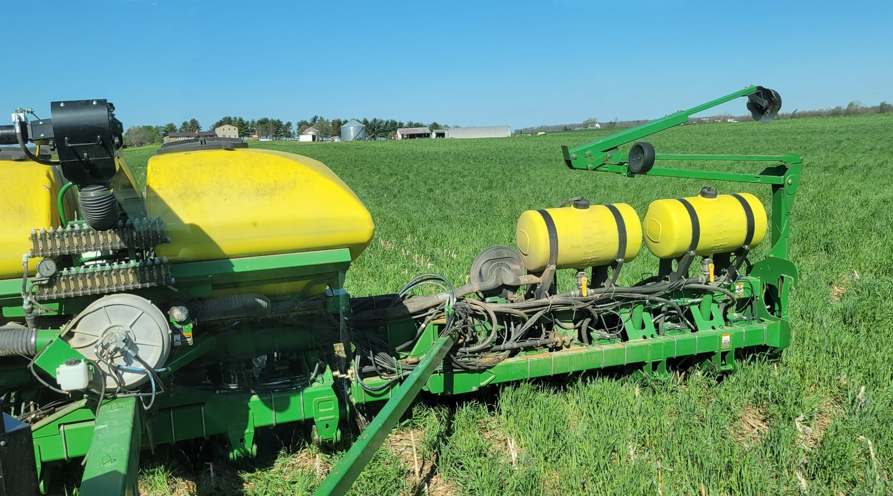 John Deere planter equipped for planting-pass seed and fertility products in an Ohio field