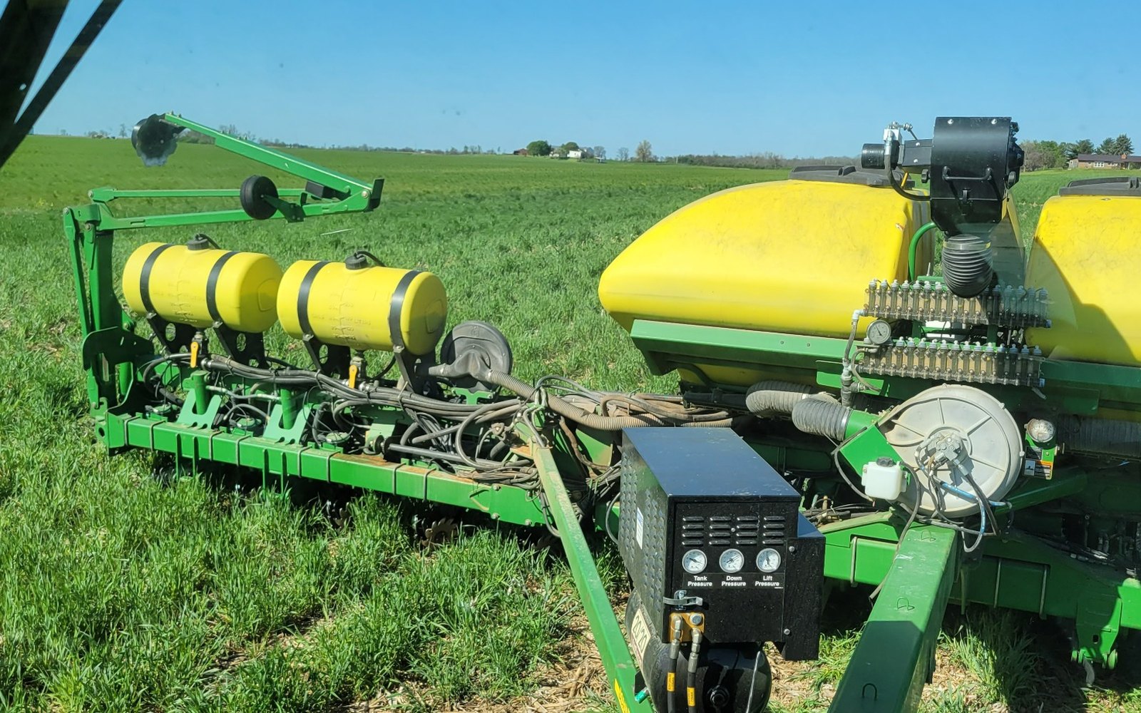 Planter tanks, meters and delivery system used during planting