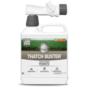 Front view of Turf Titan Thatch Buster jug displaying the product name and logo.