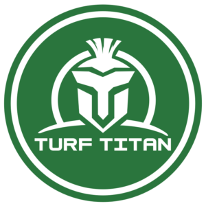 Logo of Turf Titan, featuring bold, white text with a leaf symbol, representing eco-friendly lawn care solutions